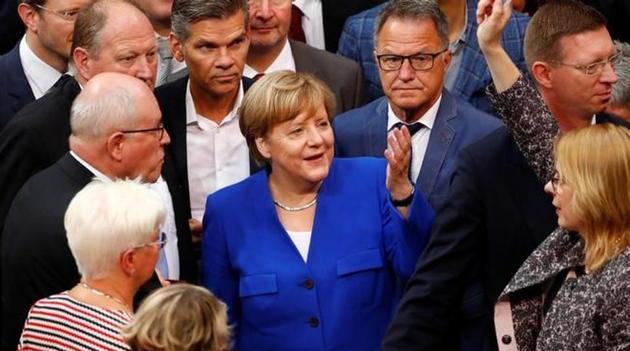 German Chancellor Angela Merkel gestures as members of the lower house of parliament Bundestag vote on legalising same-sex marriage, in Berlin, June 30, 2017.(Reuters) German Chancellor Angela Merkel gestures as members of the lower house of parliament Bundestag vote on legalising same-sex marriage, in Berlin, June 30, 2017.(Reuters)