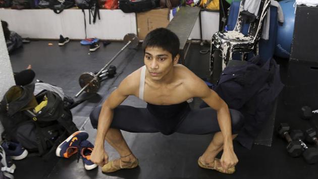 Amiruddin Shah stretches at a dance academy in Mumbai. Last year, Shah and another of Maor’s proteges, 22-year-old Manish Chauhan, won scholarships to study at the Joffrey Ballet School in New York but neither received visas in time. (Rajanish Kakade/AP) Amiruddin Shah stretches at a dance academy in Mumbai. Last year, Shah and another of Maor’s proteges, 22-year-old Manish Chauhan, won scholarships to study at the Joffrey Ballet School in New York but neither received visas in time. (Rajanish Kakade/AP)