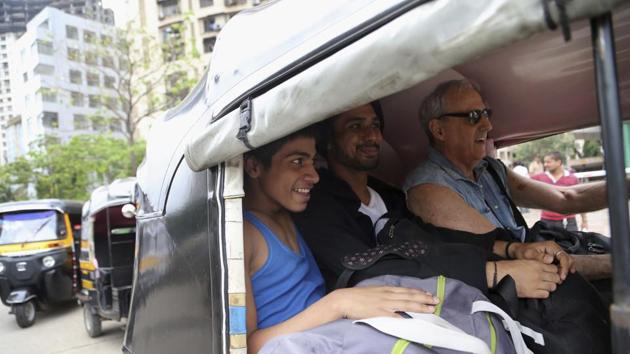 Amiruddin Shah(L) leaves with his instructor(R) in an auto rickshaw after a practice session in Mumbai. Shah hopes for a professional contract that would see him perform in ballets worldwide and help transform the lives of his parents and seven siblings who he says have often struggled to afford food. (AP) Amiruddin Shah(L) leaves with his instructor(R) in an auto rickshaw after a practice session in Mumbai. Shah hopes for a professional contract that would see him perform in ballets worldwide and help transform the lives of his parents and seven siblings who he says have often struggled to afford food. (AP)