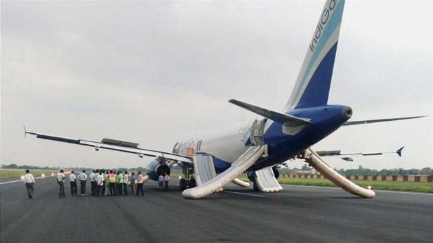 The Delhi-bound Indigo flight parked on the runway after smoke was detected in its cabin while taking off from Lok Nayak Jayaprakash Narayan airport in Patna on Friday.(PTI)