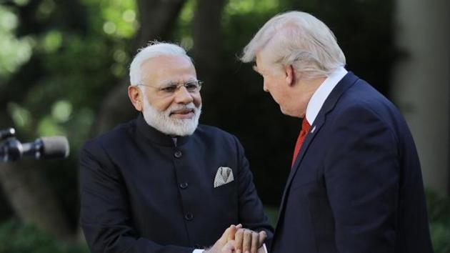 U.S. President Donald Trump (R) greets Prime Minister Narendra Modi during their joint news conference in the Rose Garden of the White House in Washington, June 26(Reuters)