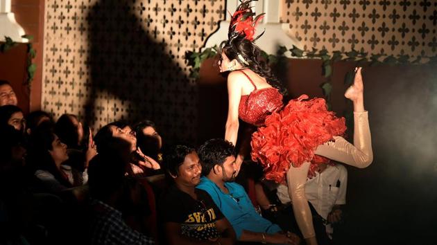 A performer interacts with the audience at Damodar Hall.  (Anshuman Poyrekar/HT Photo) 