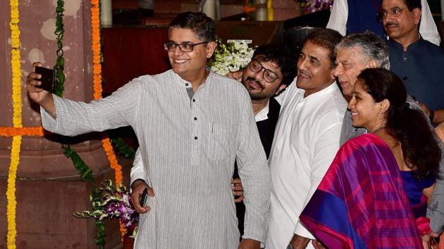 Baijayant Panda takes selfie with Babul Supriyo, NCP's Praful Patel and Supriya Sule as they leave Parliament after the launch of 'Goods and Services Tax (GST)' in New Delhi on Saturday.(PTI Photo)
