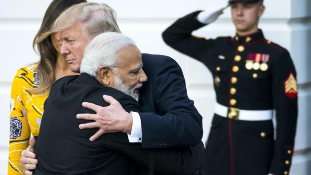 President Donald Trump embraces Prime Minister Narendra Modi during the latter’s visit, at the White House in Washington D.C, United States. (Doug Mills / NYT)