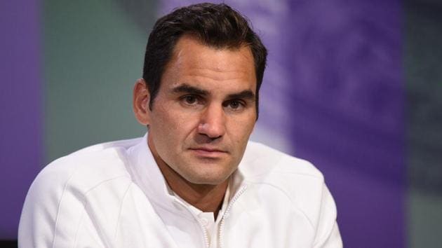 Switzerland's Roger Federer addresses a press conference at Wimbledon on July 1. (AFP) Switzerland's Roger Federer addresses a press conference at Wimbledon on July 1. (AFP)