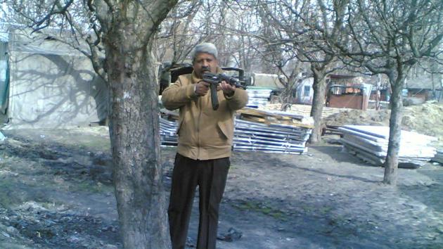 Military intelligence operatives work in civil clothes but are always alert to attacks. Colonel Bipin Pathak armed with an assault rifle ready to carry out a raid, somewhere in Kashmir, circa early 2000s. (Colonel Bipin Pathak) Military intelligence operatives work in civil clothes but are always alert to attacks. Colonel Bipin Pathak armed with an assault rifle ready to carry out a raid, somewhere in Kashmir, circa early 2000s. (Colonel Bipin Pathak)