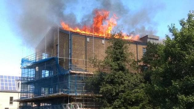 Flames engulfed the roof of the Bow Wharf building in London on Sunday. (Photo: Twitter) Flames engulfed the roof of the Bow Wharf building in London on Sunday. (Photo: Twitter)