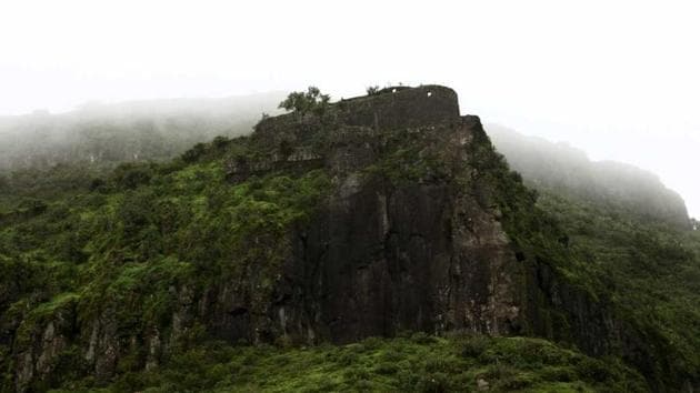 Purandar fort, located around 50-km away from Pune city, is a hot pick for trekkers and weekend tourists.(HT PHOTO)