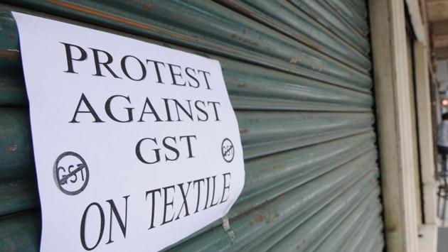 Although economist are hailing GST, small traders have come in protest of the new tax reform. (HT File Photo) Although economist are hailing GST, small traders have come in protest of the new tax reform. (HT File Photo)
