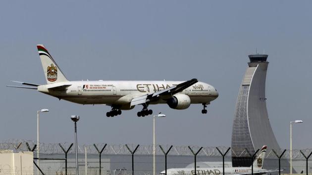 In this file photo, an Etihad Airways plane prepares to land at the Abu Dhabi airport in the United Arab Emirates.(AP File Photo)