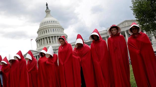 Women dressed as handmaids from the novel, film and television series ‘The Handmaid's Tale’ demonstrate against cuts for Planned Parenthood in the Republican U.S. Senate healthcare bill at the Capitol in Washington. (Joshua Roberts / Reuters) Women dressed as handmaids from the novel, film and television series ‘The Handmaid's Tale’ demonstrate against cuts for Planned Parenthood in the Republican U.S. Senate healthcare bill at the Capitol in Washington. (Joshua Roberts / Reuters)