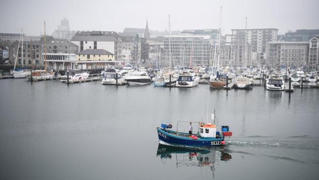 A fishing boat sails from the harbour in Plymouth fisheries, in Plymouth on May 31. (REUTERS) A fishing boat sails from the harbour in Plymouth fisheries, in Plymouth on May 31. (REUTERS)