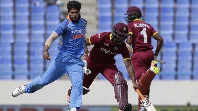 India's bowler Umesh Yadav tries to kick the ball in an unsuccessful attempt to ran out West Indies' Evin Lewis. (AP) India's bowler Umesh Yadav tries to kick the ball in an unsuccessful attempt to ran out West Indies' Evin Lewis. (AP)