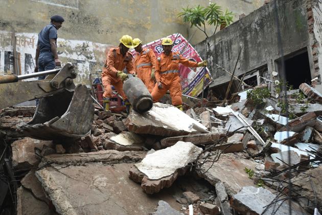The rubble of the building that collapsed in east Delhi’s Laxmi Nagar on Sunday. (Sushil Kumar/HT PHOTO) The rubble of the building that collapsed in east Delhi’s Laxmi Nagar on Sunday. (Sushil Kumar/HT PHOTO)