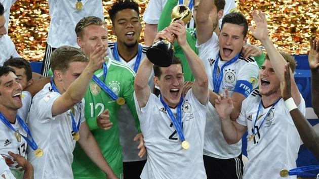Germany's players pose with the trophy after winning the 2017 Confederations Cup final. (AFP) Germany's players pose with the trophy after winning the 2017 Confederations Cup final. (AFP)
