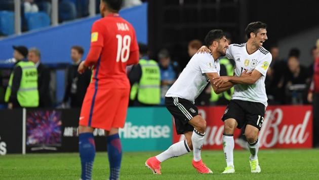 Germany's midfielder Emre Can (C) and Germany's midfielder Lars Stindl celebrate as they beat Chile 1-0. (AFP) Germany's midfielder Emre Can (C) and Germany's midfielder Lars Stindl celebrate as they beat Chile 1-0. (AFP)