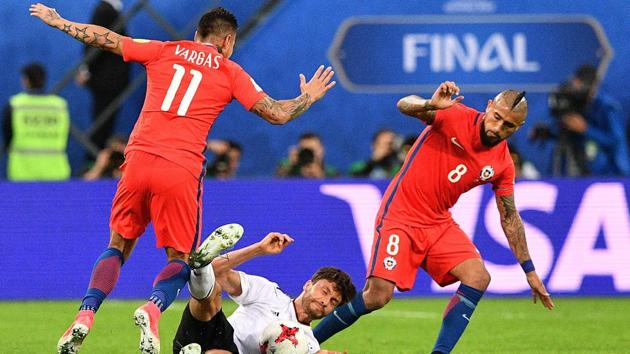 Germany's defender Jonas Hector (C) vies for the ball against Chile's midfielder Arturo Vidal during the 2017 Confederations Cup final. (AFP) Germany's defender Jonas Hector (C) vies for the ball against Chile's midfielder Arturo Vidal during the 2017 Confederations Cup final. (AFP)