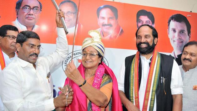 Presidential candidate Meira Kumar holds a sword presented to her by Congress leaders at a meeting in Hyderabad on Monday. (PTI) Presidential candidate Meira Kumar holds a sword presented to her by Congress leaders at a meeting in Hyderabad on Monday. (PTI)