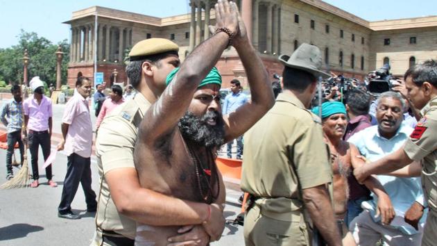 Tamil Nadu farmers staged a naked protest outside the South Block and demanded better drought-relief package from the Narendra Modi government in June. (HT File Photo) Tamil Nadu farmers staged a naked protest outside the South Block and demanded better drought-relief package from the Narendra Modi government in June. (HT File Photo)