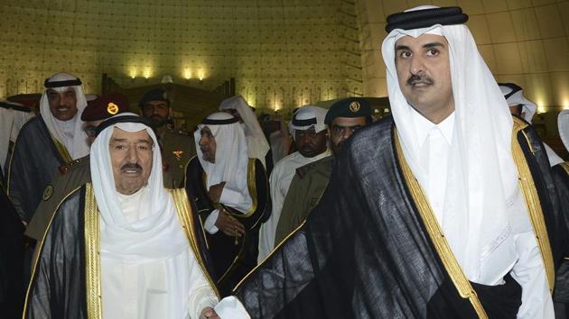FILE- In this Wednesday, June 7, 2017 file photo released by Kuwait News Agency, KUNA, Kuwait's Emir Sheikh Sabah Al Ahmad Al Sabah, left, holds the hand of Qatar's Emir Sheikh Tamim bin Hamad Al Thani in Doha, Qatar. Qatar likely faces a deadline this weekend to comply with a list of demands issued to it by Arab nations that have cut diplomatic ties to the energy-rich country, though its leaders already have dismissed the ultimatum. (AP) FILE- In this Wednesday, June 7, 2017 file photo released by Kuwait News Agency, KUNA, Kuwait's Emir Sheikh Sabah Al Ahmad Al Sabah, left, holds the hand of Qatar's Emir Sheikh Tamim bin Hamad Al Thani in Doha, Qatar. Qatar likely faces a deadline this weekend to comply with a list of demands issued to it by Arab nations that have cut diplomatic ties to the energy-rich country, though its leaders already have dismissed the ultimatum. (AP)