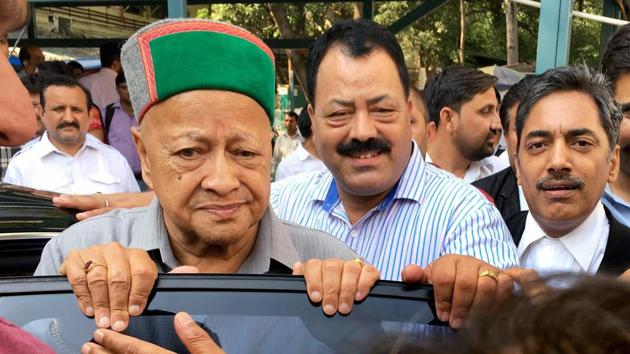 Himachal Pradesh CM Virbhadra Singh leaves after appearing in connection with disproportionate assets case at Patiala House Court, in New Delhi. (PTI File Photo) Himachal Pradesh CM Virbhadra Singh leaves after appearing in connection with disproportionate assets case at Patiala House Court, in New Delhi. (PTI File Photo)