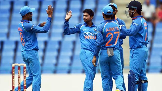 India's Kuldeep Yadav (C) celebrates with teammates after dismissing West Indies' Evin Lewis. (AFP) India's Kuldeep Yadav (C) celebrates with teammates after dismissing West Indies' Evin Lewis. (AFP)