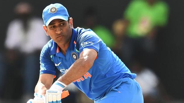 MS Dhoni scored a fifty off 108 balls as India fell short by 11 runs in the fourth ODI against West Indies in Antigua.(AFP)