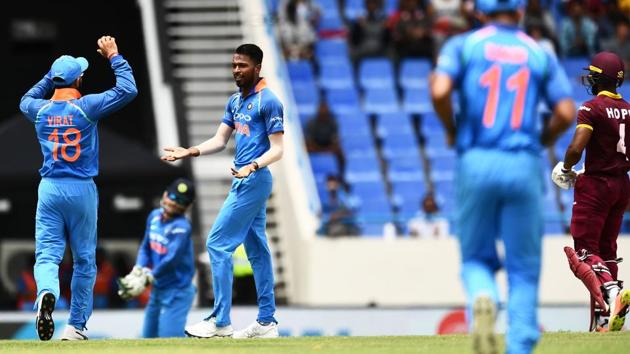 India's Hardik Pandya (C) celebrates with his teammates after dismissing West Indies' Shai Hope (R). (AFP) India's Hardik Pandya (C) celebrates with his teammates after dismissing West Indies' Shai Hope (R). (AFP)