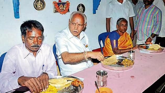 State BJP president BS Yeddyurappa has lunch with a member of the Dalit community near Chikmagalur in Karnataka. (PTI File Photo) State BJP president BS Yeddyurappa has lunch with a member of the Dalit community near Chikmagalur in Karnataka. (PTI File Photo)