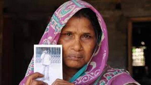 Waiting for justice. Ashia Bibi holding the photo of her son Imadul, who was killed in police firing on March 14, 2007 in Nandigram. (Subhankar Chakraborty) Waiting for justice. Ashia Bibi holding the photo of her son Imadul, who was killed in police firing on March 14, 2007 in Nandigram. (Subhankar Chakraborty)