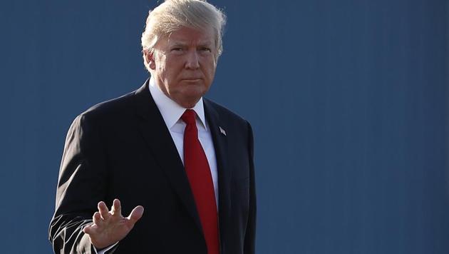 President Donald Trump waves as he walks from Marine One to board Air Force One at Morristown Municipal Airport, in Morristown. (AP File Photo) President Donald Trump waves as he walks from Marine One to board Air Force One at Morristown Municipal Airport, in Morristown. (AP File Photo)