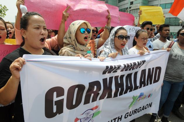 Members of the Gorkha community chant statehood slogans during a rally in Gurgaon on Tuesday.(Praveen Kumar/HT PHOTO)