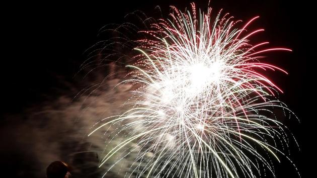 A man watches a fireworks display for Independence Day at Worlds of Fun amusement park on July 3 in Kansas City (AP Photo) A man watches a fireworks display for Independence Day at Worlds of Fun amusement park on July 3 in Kansas City (AP Photo)