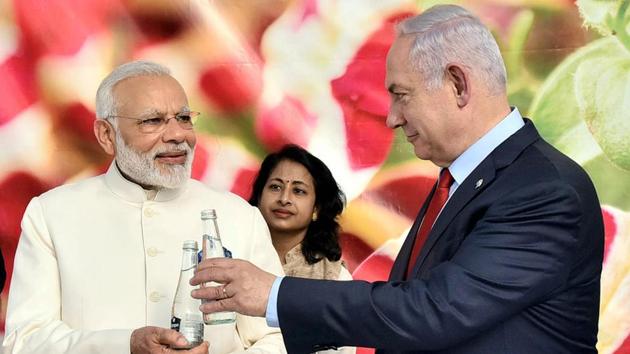 Prime Minister Narendra Modi with his Israeli counterpart Benjamin Netanyahu, visiting the Danziger Flower Farm- a leading facility for R&D in plant varieties, in Tel Aviv, Israel on Tuesday.(PTI Photo)