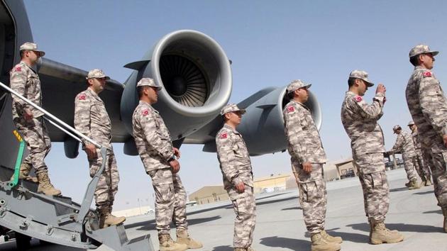 Turkish troops seen at their military base in Doha, Qatar June 23, 2017. The blockade demands the withdrawal of Turkish troops from its state-of-the-art base in Qatar, which Turkish president Erdogan has also refused to implement in a show of support to Qatar. (Qatar News Agency / Reuters) Turkish troops seen at their military base in Doha, Qatar June 23, 2017. The blockade demands the withdrawal of Turkish troops from its state-of-the-art base in Qatar, which Turkish president Erdogan has also refused to implement in a show of support to Qatar. (Qatar News Agency / Reuters)