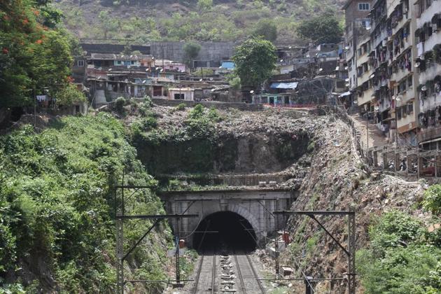 The TMC, railways and forest department had issued evacuation notices to 80 homes above the Parsik tunnel and the demolition drive was supposed to be held on June 28.(HT photo)