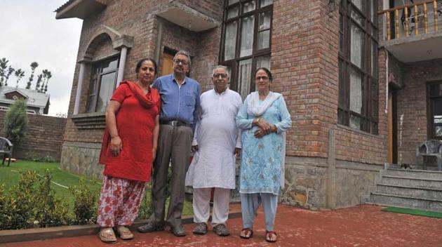 Surinder and Santosh Kachroo with her parents at their new home in Srinagar, not far from the airport. (Waseem Andrabi/Hindustan Times) Surinder and Santosh Kachroo with her parents at their new home in Srinagar, not far from the airport. (Waseem Andrabi/Hindustan Times)