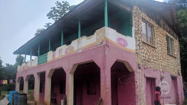 Bolt senior’s grocery store, painted in pink, where he sold provisions -- meat, fish, rice etc -- for 15 years shut down last week (Ht Photo) 