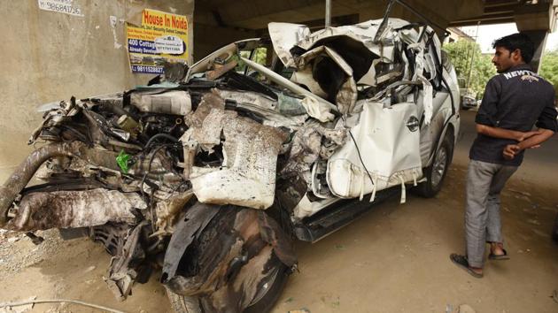 Mangled remains of the Fortuner that hit a dumper on the elevated road in Noida. (Virendra Singh Gosain/HT Photo) Mangled remains of the Fortuner that hit a dumper on the elevated road in Noida. (Virendra Singh Gosain/HT Photo)