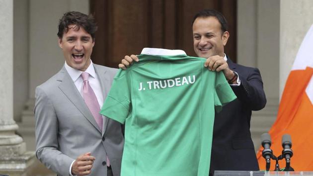 Ireland’s Prime Minister Leo Varadkar, right, gives his Canadian counterpart, Justin Trudeau, an Irish themed rugby shirt during a press conference at Farmleigh House in Dublin on July 4. (AP Photo) Ireland’s Prime Minister Leo Varadkar, right, gives his Canadian counterpart, Justin Trudeau, an Irish themed rugby shirt during a press conference at Farmleigh House in Dublin on July 4. (AP Photo)