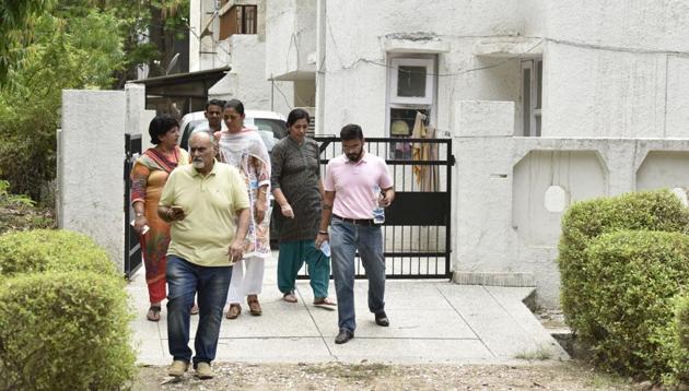 Relatives of Colonel (retd) Kulbhushan Manocha’s exiting his house. Manocha died inside his residence but the body was recovered only two days later. (Virendra Singh Gosain/HT FILE PHOTO) Relatives of Colonel (retd) Kulbhushan Manocha’s exiting his house. Manocha died inside his residence but the body was recovered only two days later. (Virendra Singh Gosain/HT FILE PHOTO)