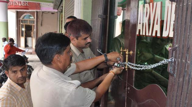 Officials said that the two hotels, Devender and Aryadeep, were sealed following raids in March but they were found operating and the official seals were broken. (Sakib Ali/HT Photo) Officials said that the two hotels, Devender and Aryadeep, were sealed following raids in March but they were found operating and the official seals were broken. (Sakib Ali/HT Photo)