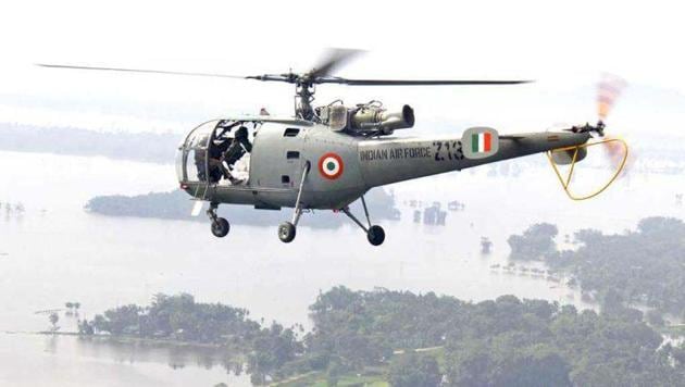 Representative Image | An Indian Air Force (IAF) helicopter, carrying relief supplies, flies over the flooded areas of the Sonitpur district, Assam. (Reuters) Representative Image | An Indian Air Force (IAF) helicopter, carrying relief supplies, flies over the flooded areas of the Sonitpur district, Assam. (Reuters)