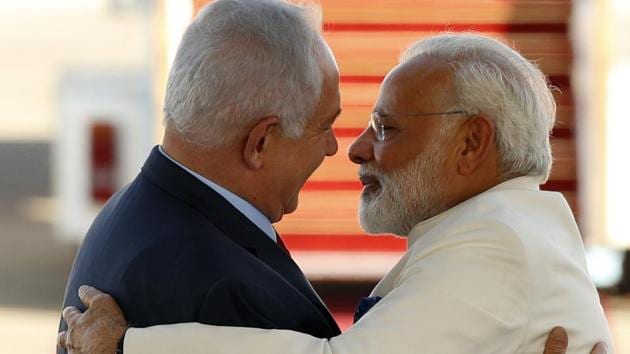 Israeli Prime Minister Benjamin Netanyahu (L) greets his Indian counterpart Narendra Modi (R) during an official ceremoney at Ben-Gurion International airport near Tel Aviv on July 4, 2017. Modi is the first Indian prime minister to visit Israel, the result of growing ties that have led to billions of dollars in defence deals.(AFP) Israeli Prime Minister Benjamin Netanyahu (L) greets his Indian counterpart Narendra Modi (R) during an official ceremoney at Ben-Gurion International airport near Tel Aviv on July 4, 2017. Modi is the first Indian prime minister to visit Israel, the result of growing ties that have led to billions of dollars in defence deals.(AFP)