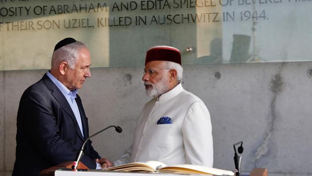 Indian Prime Minister Narendra Damodardas Modi, right, shakes hands with Israeli Prime Minister Benjamin Netanyahu after signing the guestbook at the Yad Vashem Holocaust memorial museum in Jerusalem. (AP Photo) Indian Prime Minister Narendra Damodardas Modi, right, shakes hands with Israeli Prime Minister Benjamin Netanyahu after signing the guestbook at the Yad Vashem Holocaust memorial museum in Jerusalem. (AP Photo)