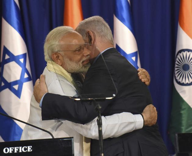 Narendra Modi and his Israeli counterpart Benjamin Netanyahu embrace after a joint press conference at Netanyahu's residence in Jerusalem on Tuesday. (AP) Narendra Modi and his Israeli counterpart Benjamin Netanyahu embrace after a joint press conference at Netanyahu's residence in Jerusalem on Tuesday. (AP)
