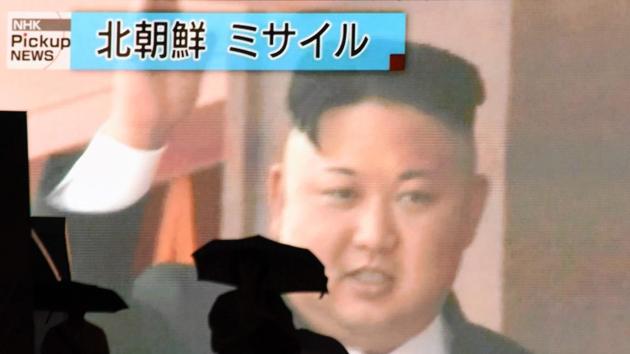 Pedestrians walk past a huge screen in Tokyo broadcasting file news footage of North Korean leader Kim Jong-Un. (AFP File Photo) Pedestrians walk past a huge screen in Tokyo broadcasting file news footage of North Korean leader Kim Jong-Un. (AFP File Photo)