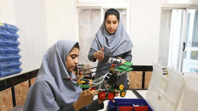 Members of Afghan robotics girls team which was denied entry into the United States for a competition, work on their robots in Herat province, Afghanistan July 4, 2017. REUTERS/Mohammad Shoib (Reuters) Members of Afghan robotics girls team which was denied entry into the United States for a competition, work on their robots in Herat province, Afghanistan July 4, 2017. REUTERS/Mohammad Shoib (Reuters)