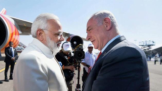 Prime Minister, Narendra Modi being received by the Prime Minister of Israel, Benjamin Netanyahu, on his arrival, at Ben Gurion Airport, in Tel Aviv on Tuesday.(PTI)