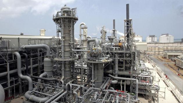 A gas production facility is seen at Ras Laffan, Qatar. The energy-rich Gulf nation of Qatar, facing further isolation from its neighbors amid an ongoing diplomatic rift, said on July 4, 2017, that it plans to boost production of liquefied natural gas by 30 percent over the coming years. (Maneesh Bakshi / AP File) A gas production facility is seen at Ras Laffan, Qatar. The energy-rich Gulf nation of Qatar, facing further isolation from its neighbors amid an ongoing diplomatic rift, said on July 4, 2017, that it plans to boost production of liquefied natural gas by 30 percent over the coming years. (Maneesh Bakshi / AP File)